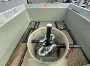 A view of the inside of a tank with pipes.