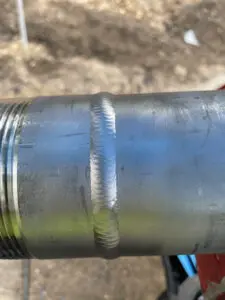 A close up of the side of a pipe