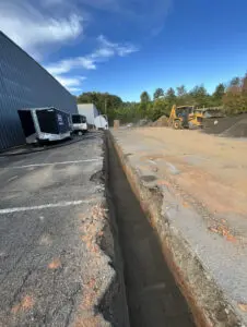 A truck is parked in the middle of an open area.