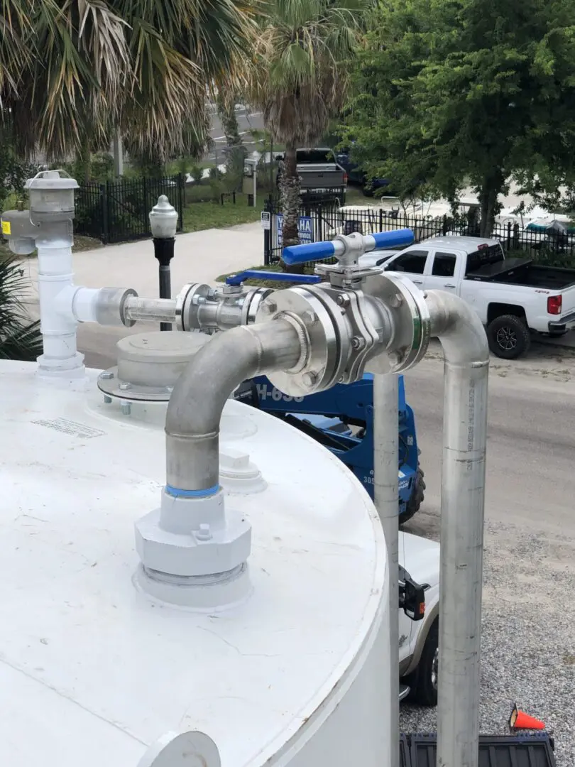 A close up of the water tank with pipes